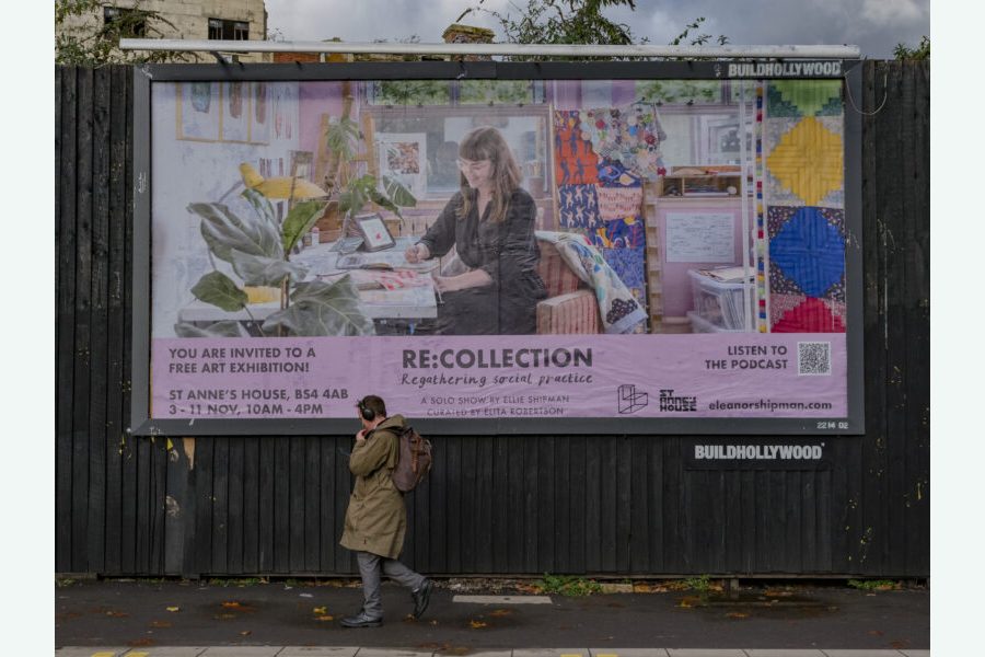 Ellie Shipman's Billboard on Temple Gate with a person walking underneath